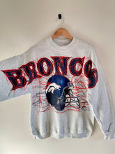 Load image into Gallery viewer, Vintage Denver broncos crewneck - broncos is spelled out largely across the chest with the broncos helmet graphic below