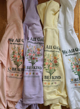 Load image into Gallery viewer, Blush pink Be Kind hooded sweatshirt with a floral design that includes embroidery and screenprinting elements
