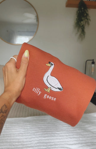 burnt orange silly goose with sunglasses embroidered crewneck