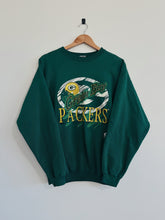 Load image into Gallery viewer, Green Bay Packers sweatshirt on a hanger against a white background
