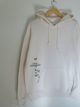 Load image into Gallery viewer, overstimulated hoodie with a butterfly design on the front pocket
